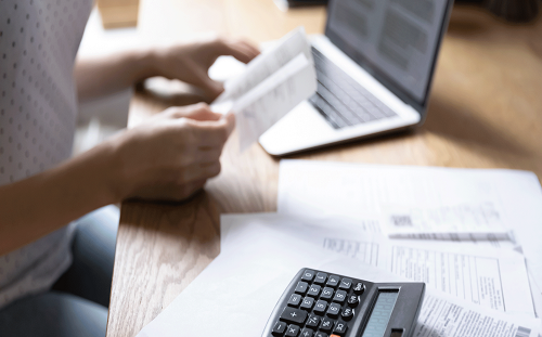 Woman involved in paperwork at office